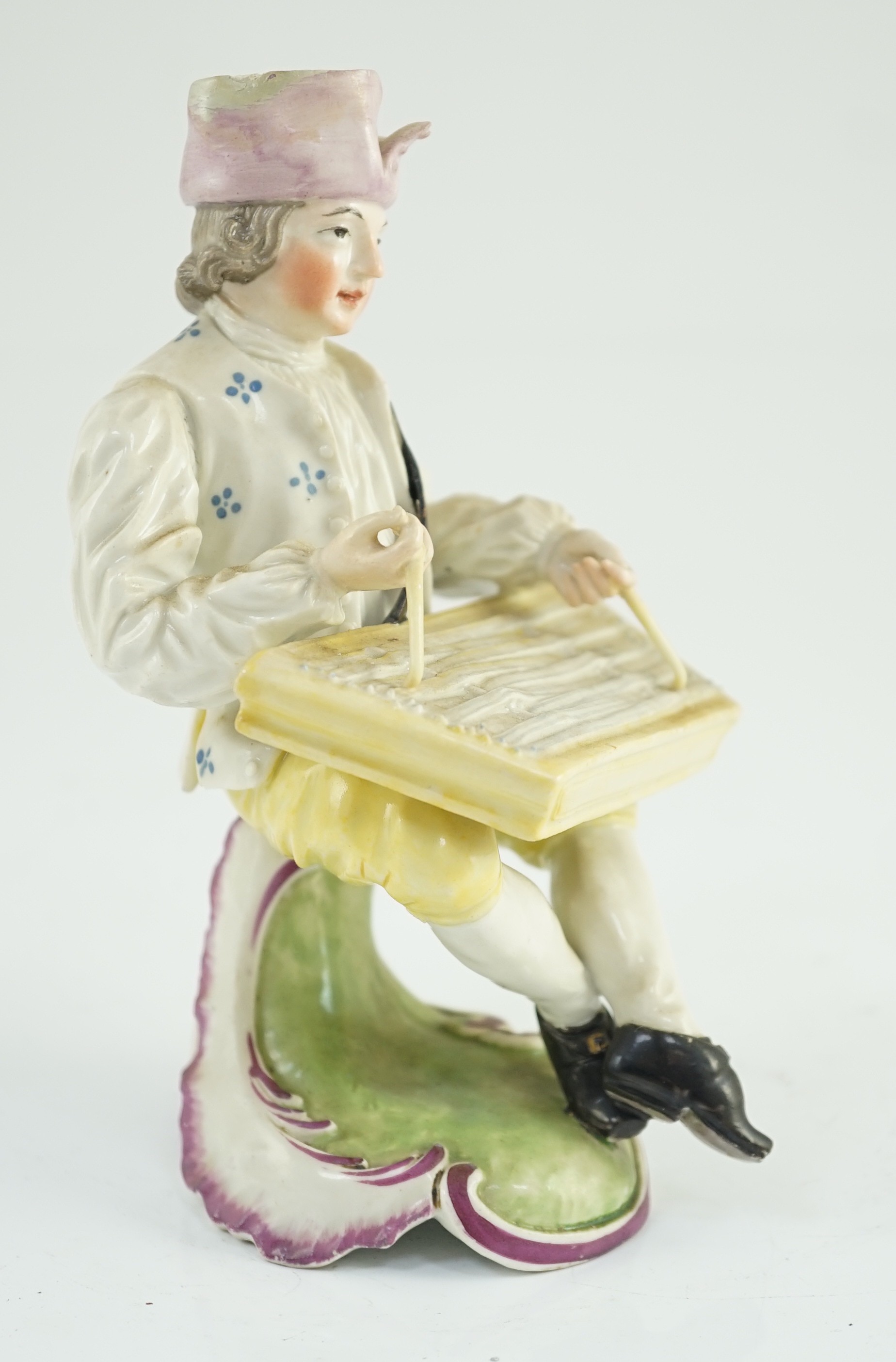 A Frankenthal porcelain figure of a zither player, c.1760, 15cm high, small areas of restoration, Provenance - purchased from Winifred Williams, Eastbourne/London before 1970.